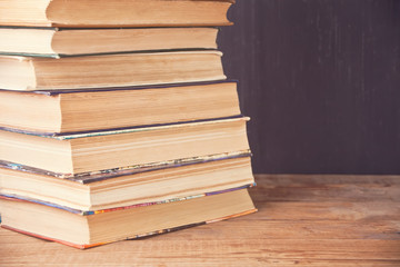 old books row on the chalk board background