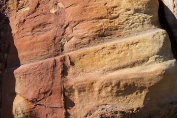 Close up of eroded sea wall on the coast at Scarborough, Yorkshire, UK