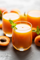 Fresh apricot juice on the marble table