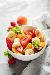 Bowl of healthy fresh fruit salad