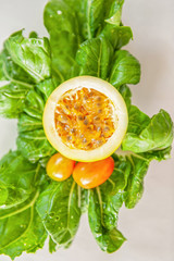 Fresh ripe organic fruits and vegetables on white background.