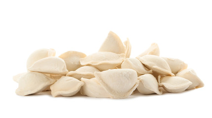 Heap of raw dumplings on white background