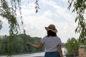 young woman in straw hat