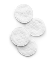 Cotton pads on white background, top view