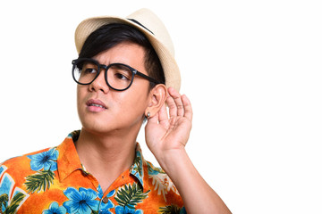 Close up of handsome Asian man listening