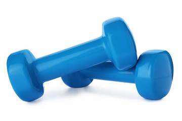 Color dumbbells on white background. Home fitness