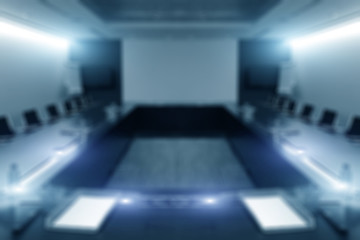 Blur image of empty boardroom with window cityscape background. 