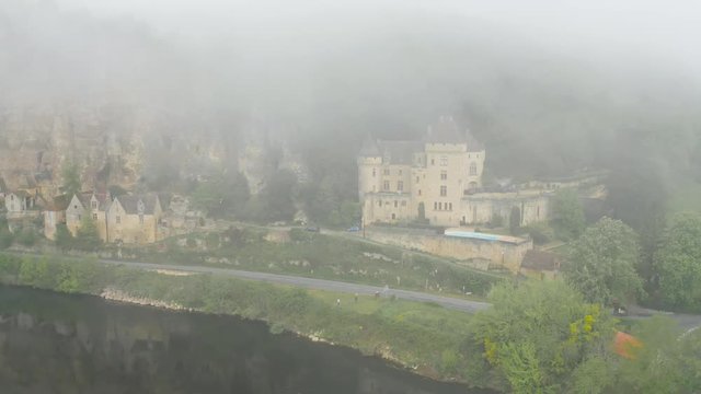 Aerial panorama of Castle Malartrie. Castle transformed from a mansion to a manor castle (château). La Roque-Gageac, Dordogne Valley, France.