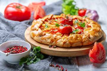 Homemade open pie (Galette) with potatoes.
