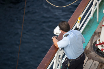 Worker in cruise ship at Kingstown Harbor, St. Vincent and the Grenadines