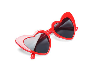 Stylish heart shaped glasses on white background
