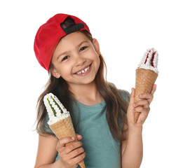Adorable little girl with delicious ice creams on white background