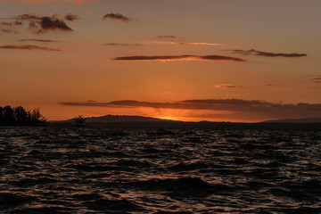 Obraz premium sunset in the lake calafquen