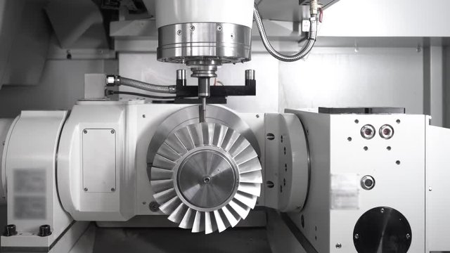 Metalworking CNC lathe milling machine. Cutting metal modern processing technology.