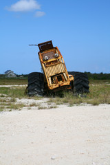 Fallen On Hard Times - an abandoned road paving truck with a face