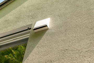modern active ventilation system per room on the outside facade of a house
