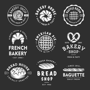 Set of vintage style bakery shop labels, badges, emblems and logo. White graphic art with engraved design elements. Collection of linear graphic on dark background.