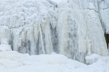 Fototapeta na wymiar Frozen waterfall cave. Jagala, Estonia.