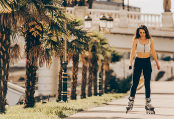 Young woman wearing roller skates outdoor