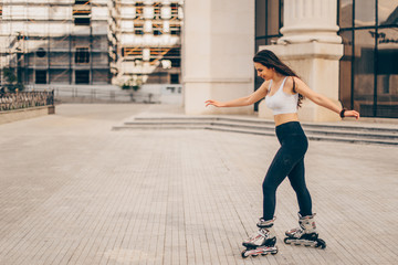 Smiling girl roller skating