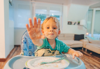 Messy kid eating