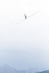 Highliner balances over the abyss.