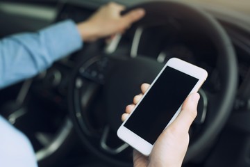 Men use mobile phones with GPS applications to navigate.