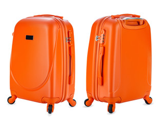 Set of orange suitcases on white background