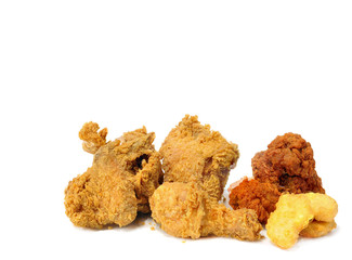 Many fired chicken and chicken nuggets and spicy drumsticks on white background. Set of fired crispy chicken.