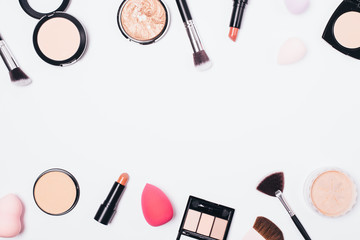 Flat lay frame of makeup products