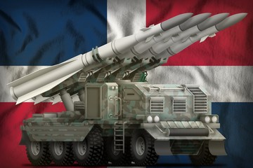 tactical short range ballistic missile with arctic camouflage on the Dominican Republic national flag background. 3d Illustration