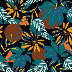 Original seamless pattern with tropical plants and leaves on black background. Vector design. Jungle print. Textiles and printing.