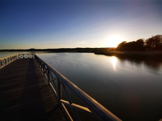 Obraz na płótnie Canvas the wonderful sunset on the Binzer Lake