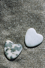 Obraz premium Hearts on fabric texture background