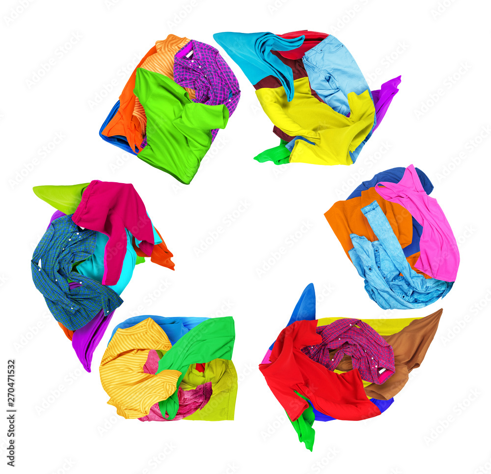 Wall mural Clothes folded in a recycling sign on a white background