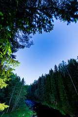 night sky with stars and clouds in long exposure shot