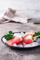 Homemade popsicles in shape of watermelon