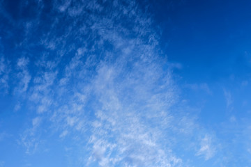 The blue sky and white clouds indicate pure and freshing.