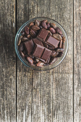 Dark chocolate bar and cocoa beans.