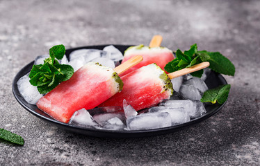 Homemade popsicles in shape of watermelon