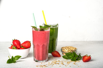 Organic berry and vegetable smoothie with oatmeal on a light background. Healthy food. Lactose free diet.