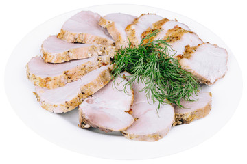 Slices of baked meat in a plate