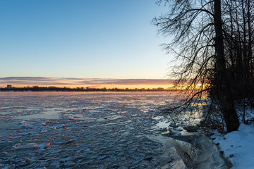 frozen river in winter countryside