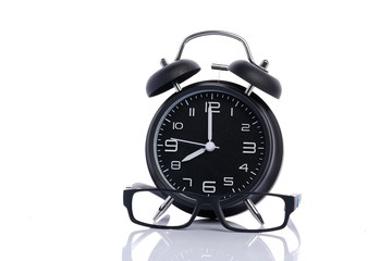 alarm clock show at 8 o’clock on white background