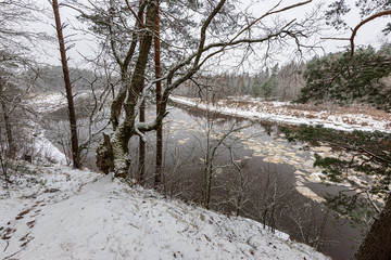 frozen river in winter countryside
