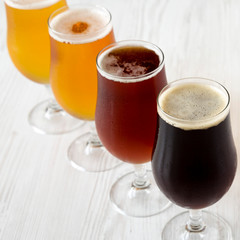 Assorted beers, side view. Close-up.