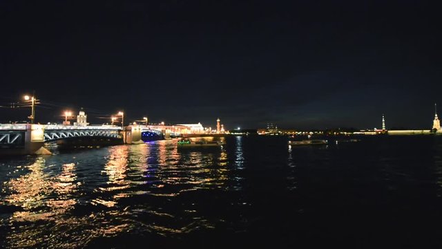 Boats on the river after breeding the bridge, night