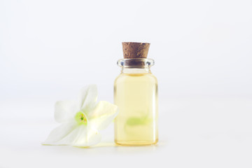 Fototapeta na wymiar winged tobacco essential oil in beautiful bottle on White background