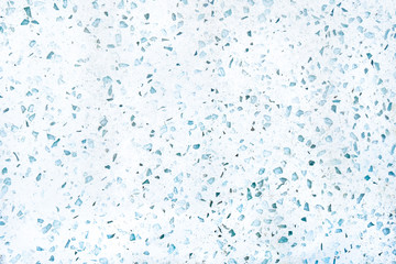 Speckled quartz countertop material as a background, flat surface, in blue and white colors.