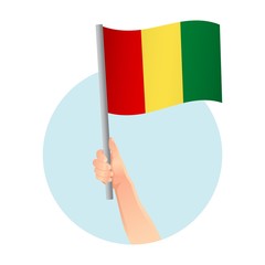 Guinea flag in hand icon